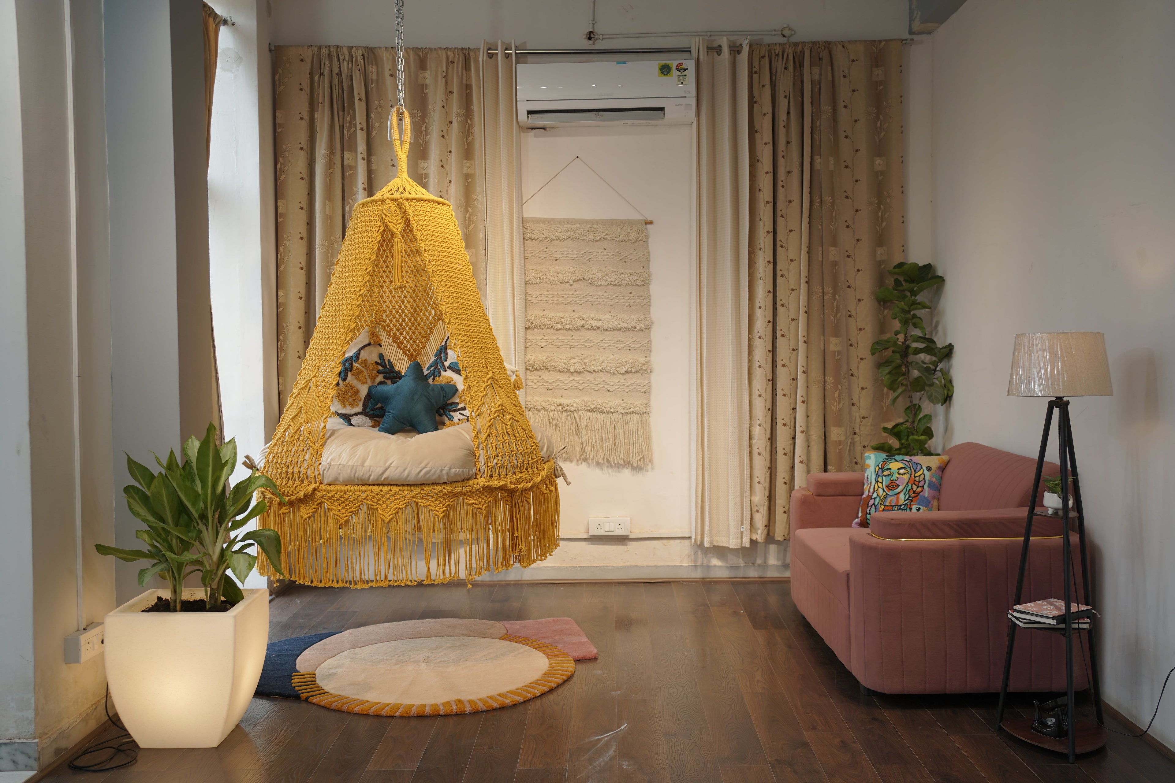 Sunny hanging macrame swing for two adults