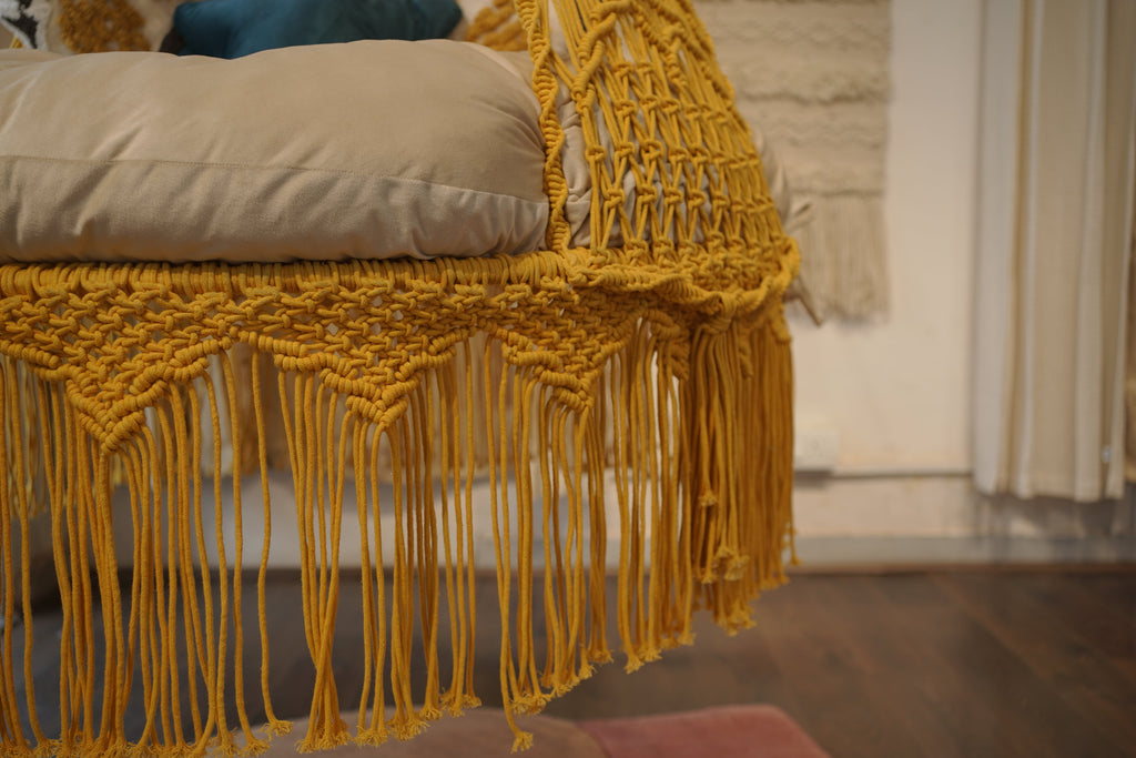 Sunny hanging macrame swing for two adults